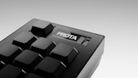a close up of a black keyboard with the word prota on it